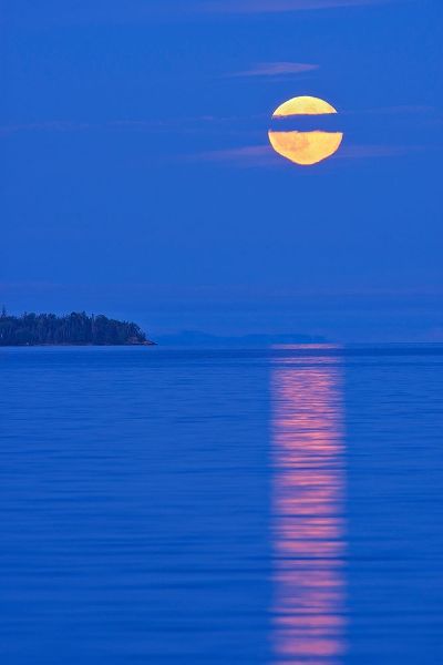 Canada-Ontario-Rossport Full moon rising over Lake Superior